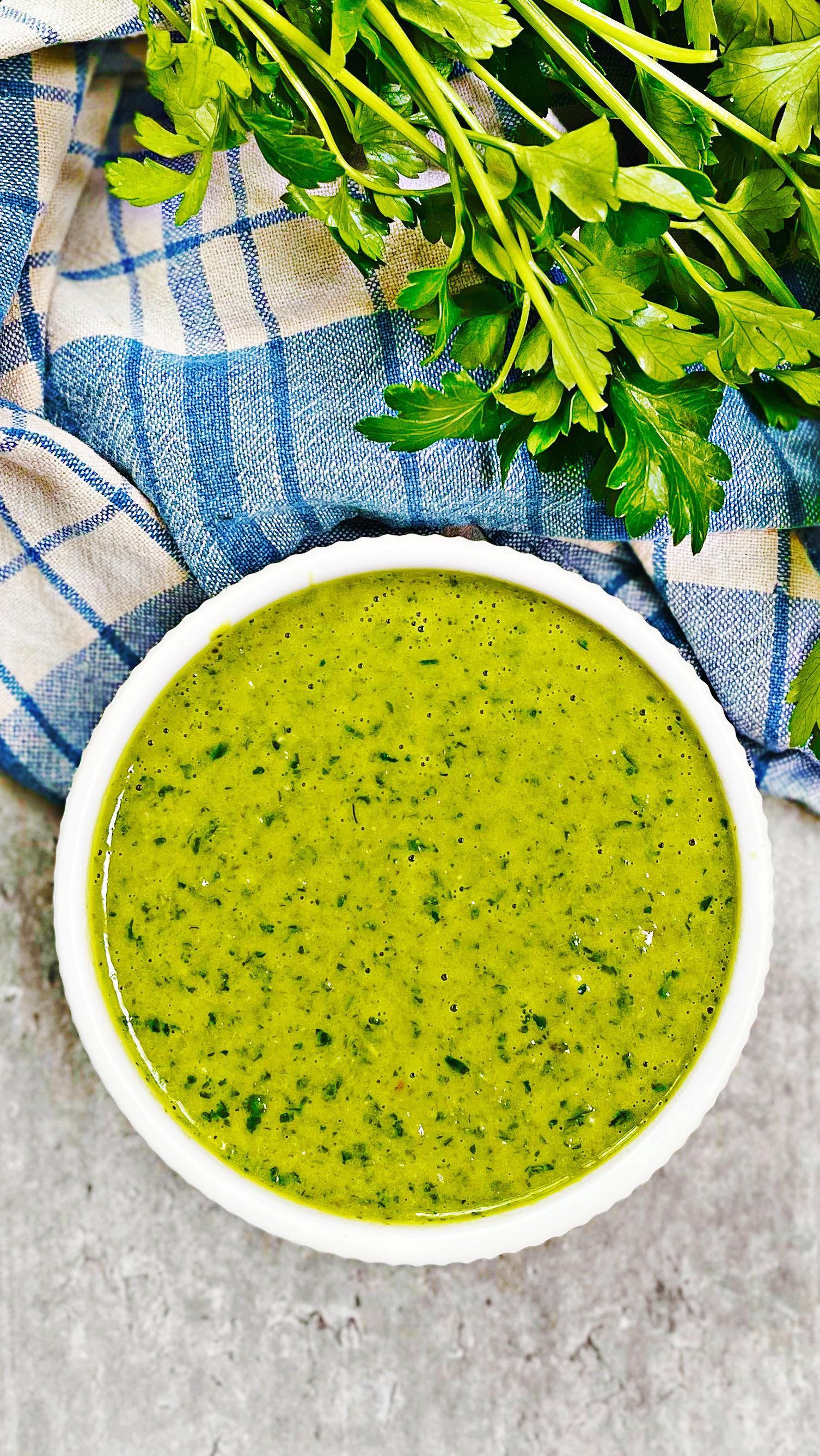 Follow @dinnerreinvented for more recipes like this easy chimichurri sauce. I spoon it over steak, yes, but it’s also a great marinade for chicken, spread on a sandwich, or dipping sauce for roasted potatoes! Full recipe now up on the DR site #chimichurri #chimichurrisauce #steak #dippingsauce #grilling #grillingseason #herbsandspices #foodblogger #momblogger #roniproter #dinnerideas #dinnerrecipes #dinnerreinvented